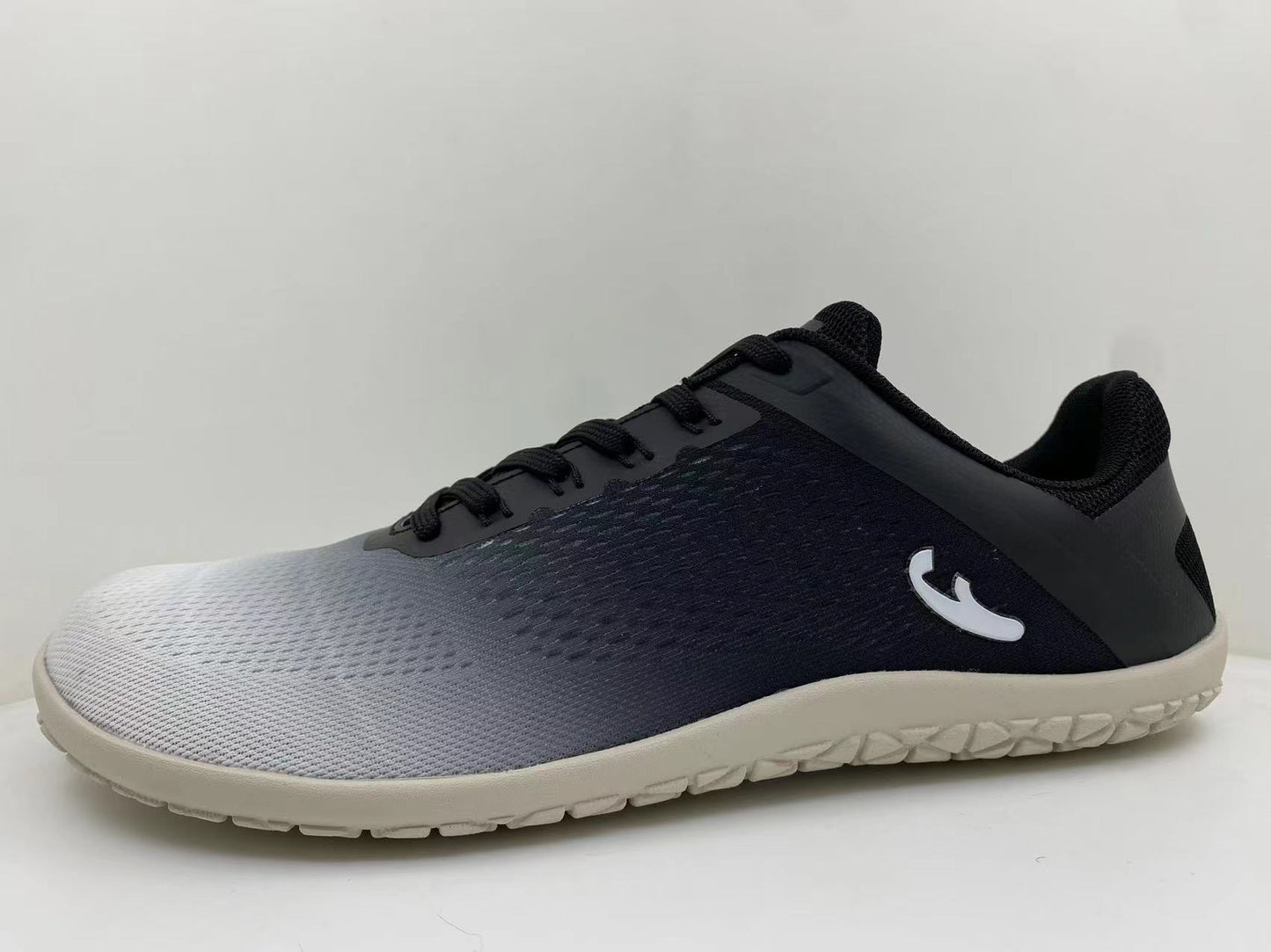 Gray Black Side View of the Freet Vibe barefoot shoe
